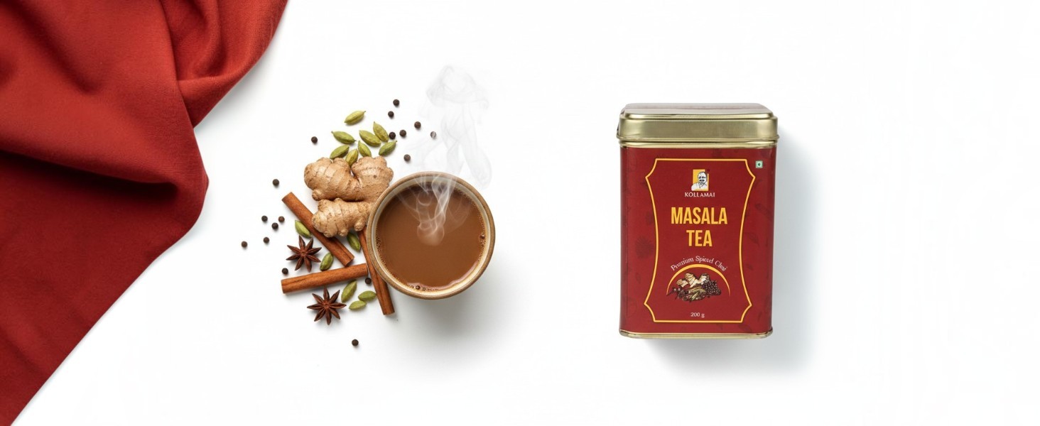 Kollamai Masala Tea tin beside a cup of brewed chai with ginger, star anise, cardamom, cinnamon, and peppercorns